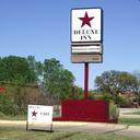 2241284 deluxe inn stephenville hotel exterior 1 def original sq128